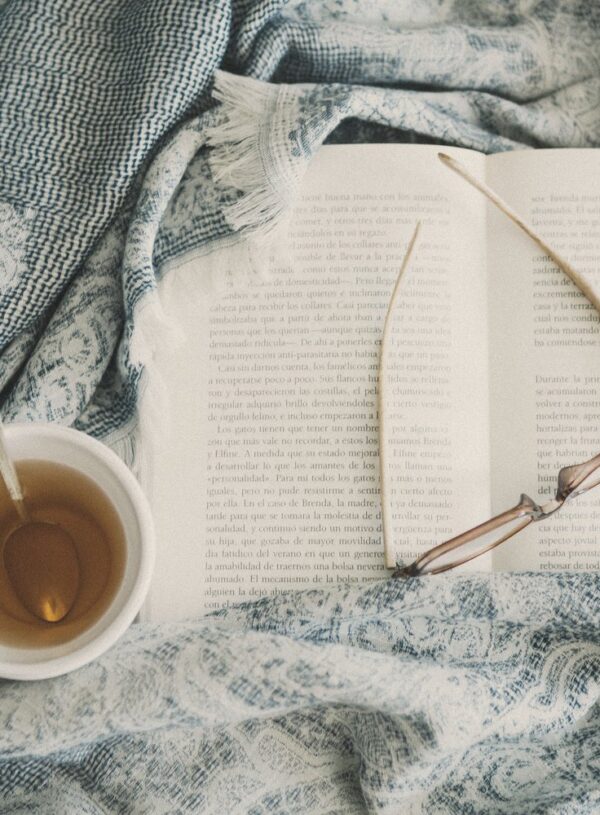 As I sit here at the kitchen table (poem)